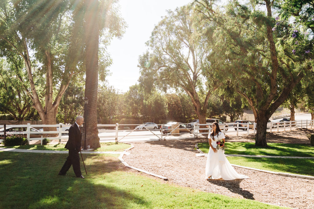 Camarillo wedding photography ; bride and father meet before the wedding ceremony