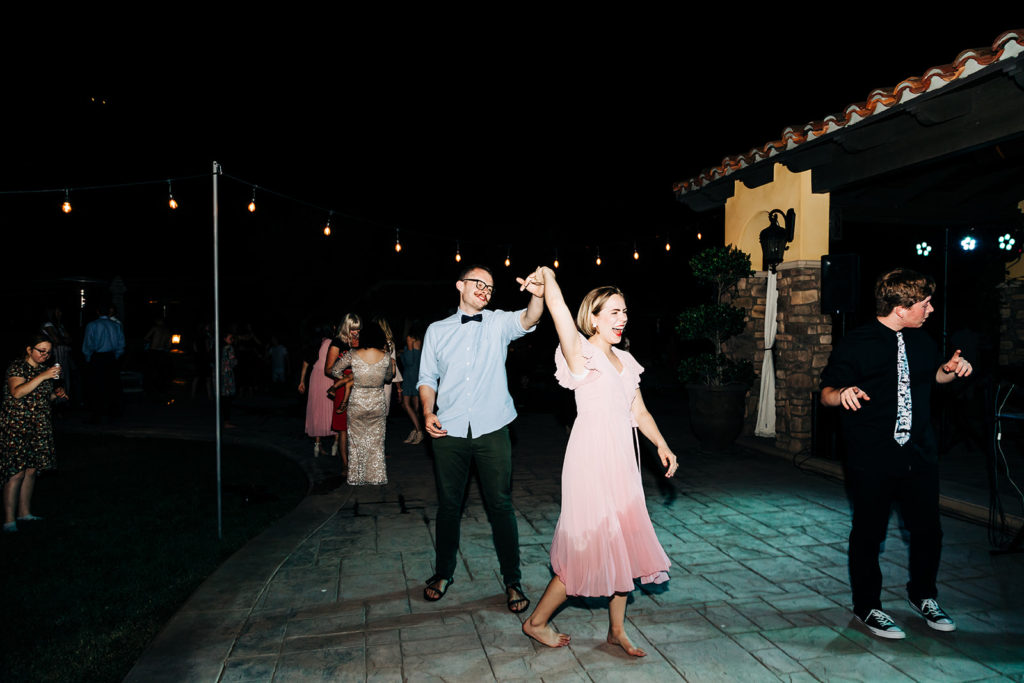 Camarillo wedding photography ; bridesmaid dances after going in the pool