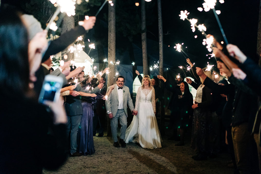 Redfish Lake Lodge wedding photography ; bride and groom walk out during a sparkler exit