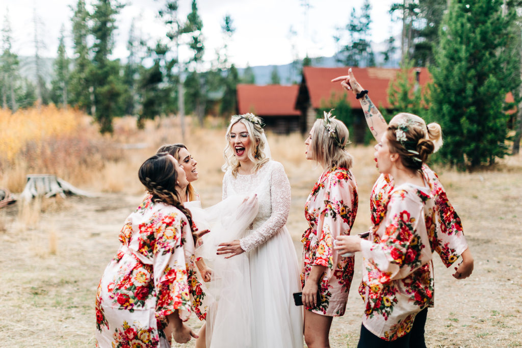 Redfish Lake Lodge wedding photography ; bride and bridal party in floral robes in field