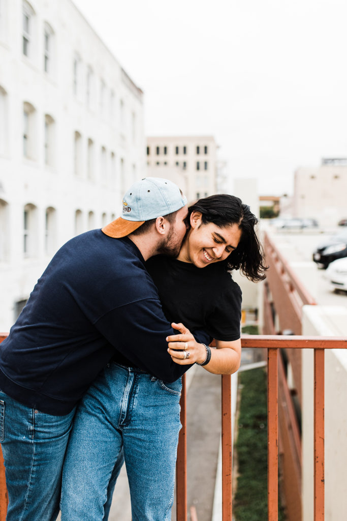 southern california engagement photos; gay couple hugging each other