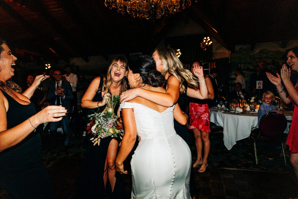 The Madonna Inn In San Luis Obispo, CA wedding photography; guests dancing and enjoying