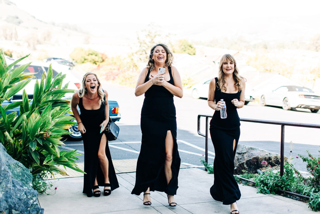 The Madonna Inn In San Luis Obispo, CA wedding photography; bridesmaids coming with joy