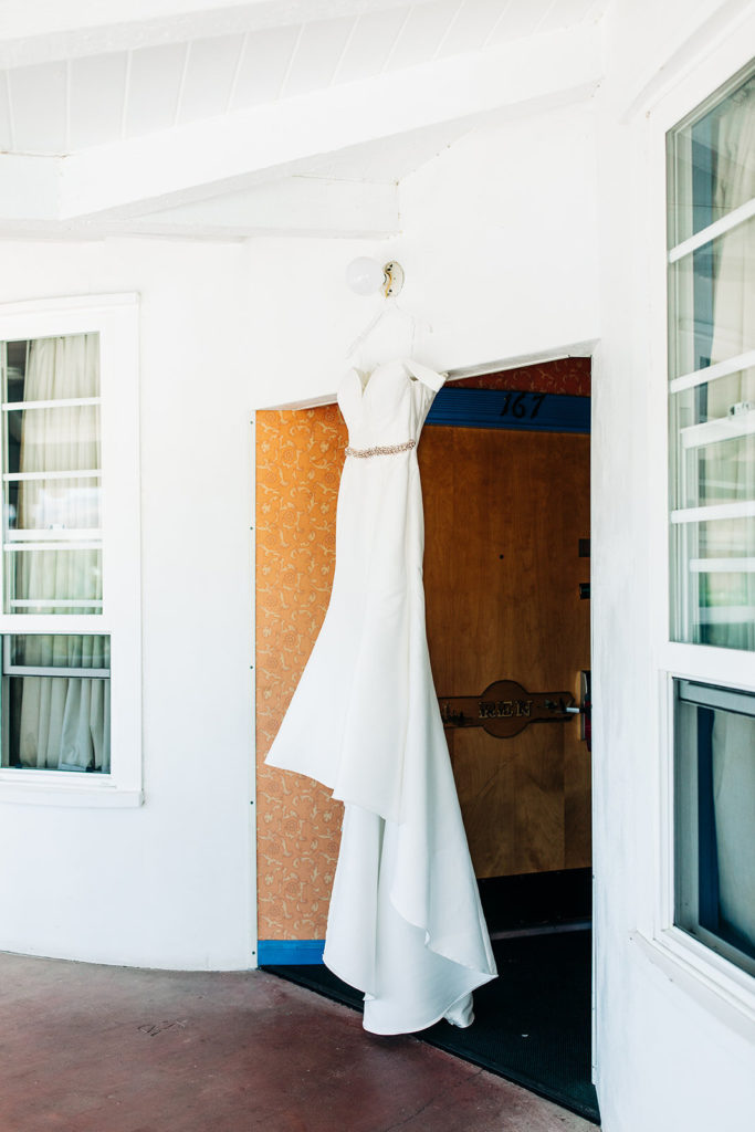 The Madonna Inn In San Luis Obispo, CA wedding photography; bridal dress hanging