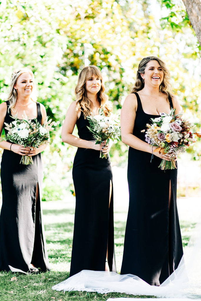 The Madonna Inn In San Luis Obispo, CA wedding photography; bridesmaids standing behind the bride