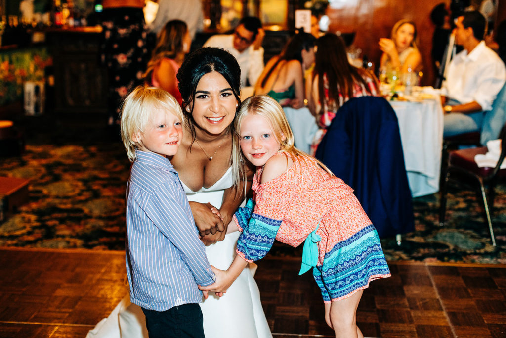 The Madonna Inn In San Luis Obispo, CA wedding photography; bride with a cute little boy and girl