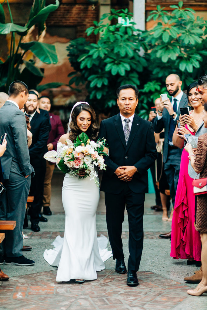 Valentine DTLA Wedding, Los Angeles wedding photographer; bride with her dad walking down the aisle