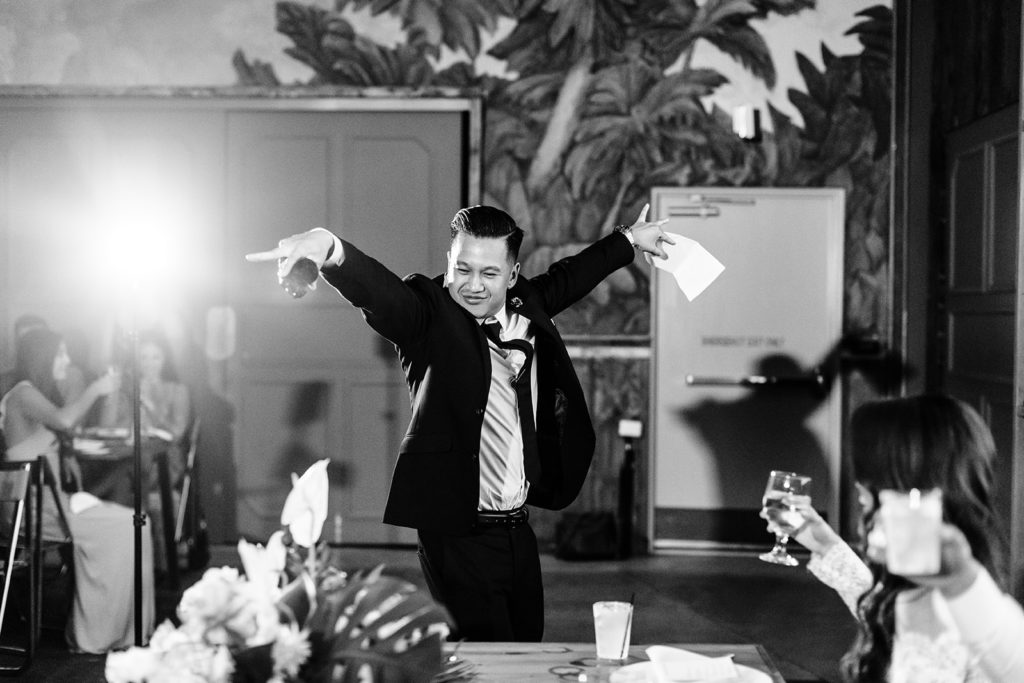 Valentine DTLA Wedding, Los Angeles wedding photographer; best man mic drop after his speech at the wedding