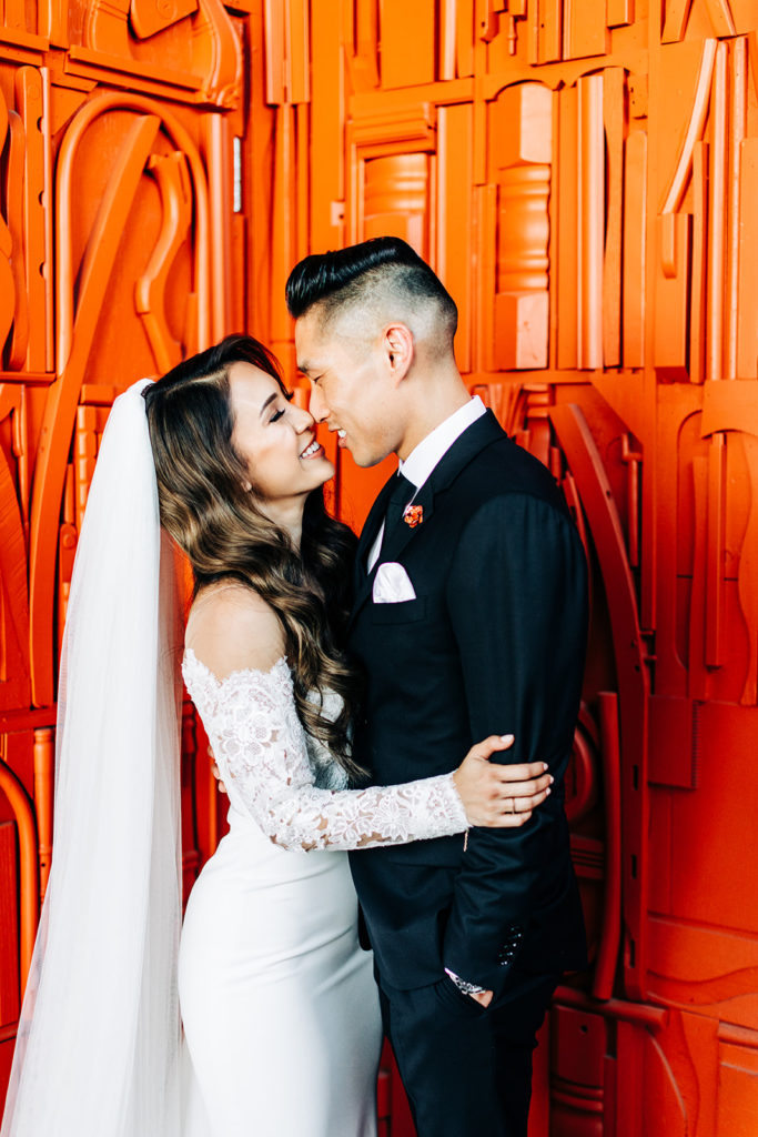 Valentine DTLA Wedding, Los Angeles wedding photographer; bride and groom looking at each other closely in their wedding attire