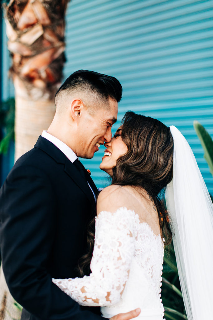 Valentine DTLA Wedding, Los Angeles wedding photographer; bride and groom smiling at each other