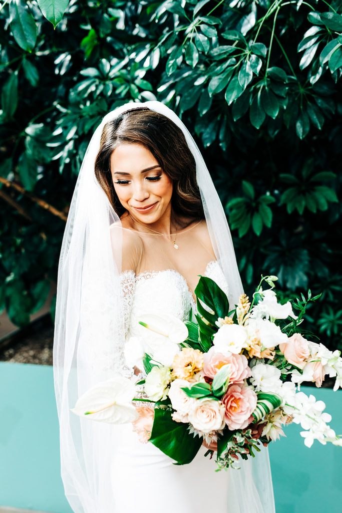 Valentine DTLA Wedding, Los Angeles wedding photographer; bride with her bridal flowers