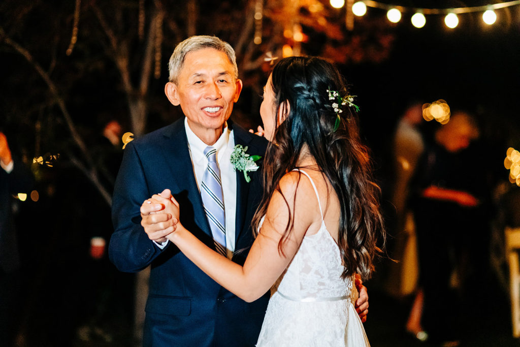 The Gold Mountain Manor In Big Bear, CA wedding photography; bride dancing with old man