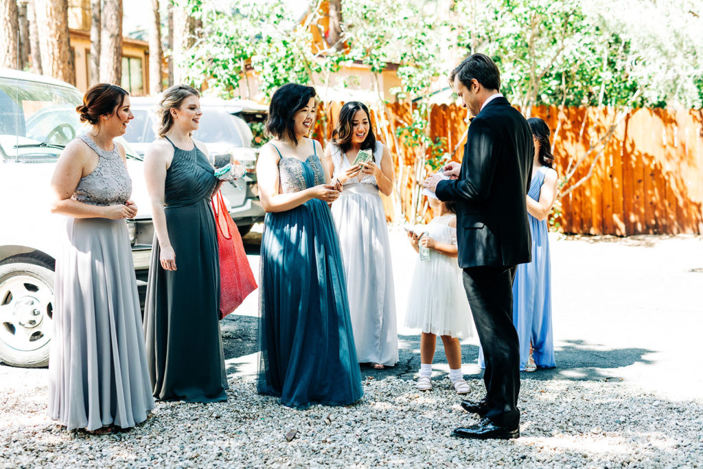 The Gold Mountain Manor In Big Bear, CA wedding photography; groom and guests standing