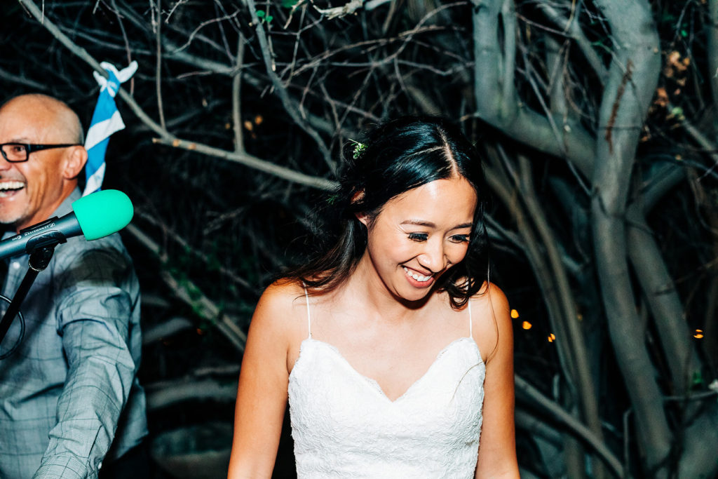The Gold Mountain Manor In Big Bear, CA wedding photography; bride smiling while looking down