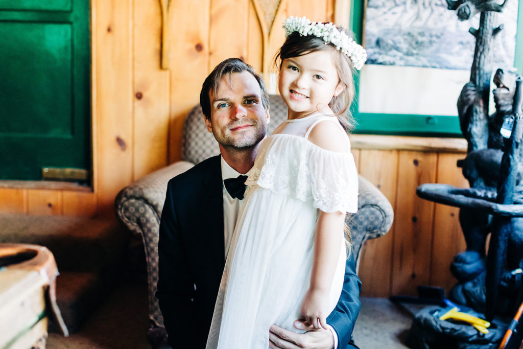 The Gold Mountain Manor In Big Bear, CA wedding photography; cute little girl with groom