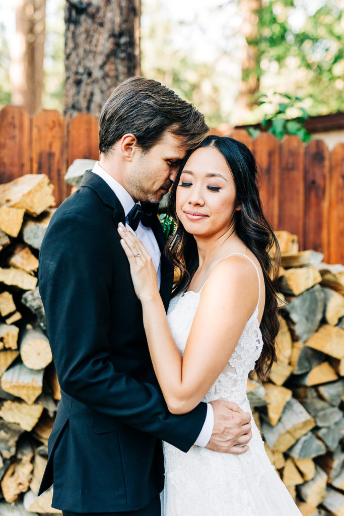 The Gold Mountain Manor In Big Bear, CA wedding photography; bride and groom hugging