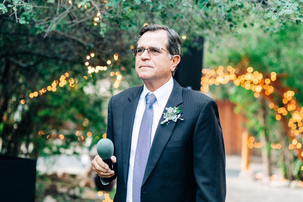The Gold Mountain Manor In Big Bear, CA wedding photography; old man on mic