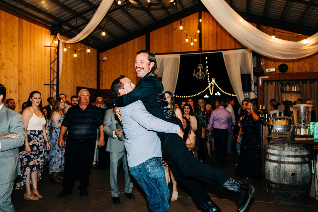 Sweet Pea Ranch In Upland, CA wedding photography; groom being lifted by his friend