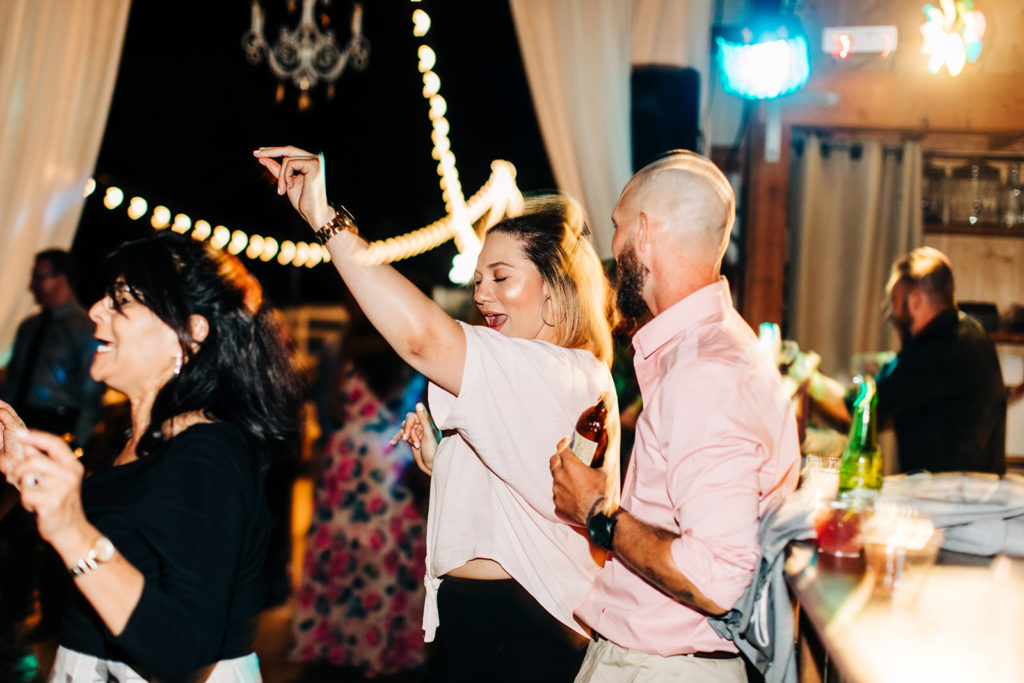 Sweet Pea Ranch In Upland, CA wedding photography; guests dancing