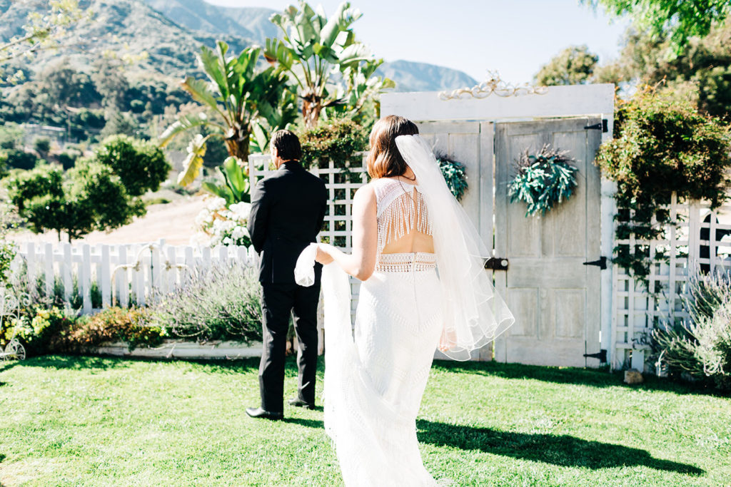 Sweet Pea Ranch In Upland, CA wedding photography; bride going towards his groom