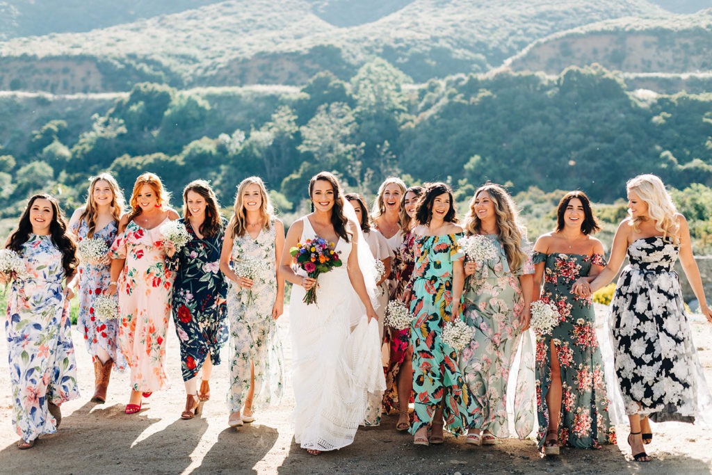 Sweet Pea Ranch In Upland, CA wedding photography; bride with bridesmaids in front of beautiful mountains
