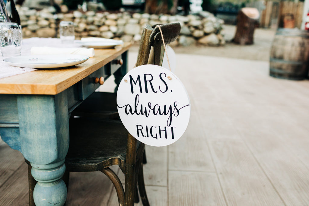 Sweet Pea Ranch In Upland, CA wedding photography; Mrs always right plate hanging on the chair of food table