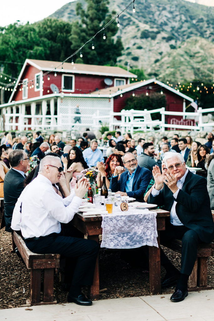 Sweet Pea Ranch In Upland, CA wedding photography; guests having toast