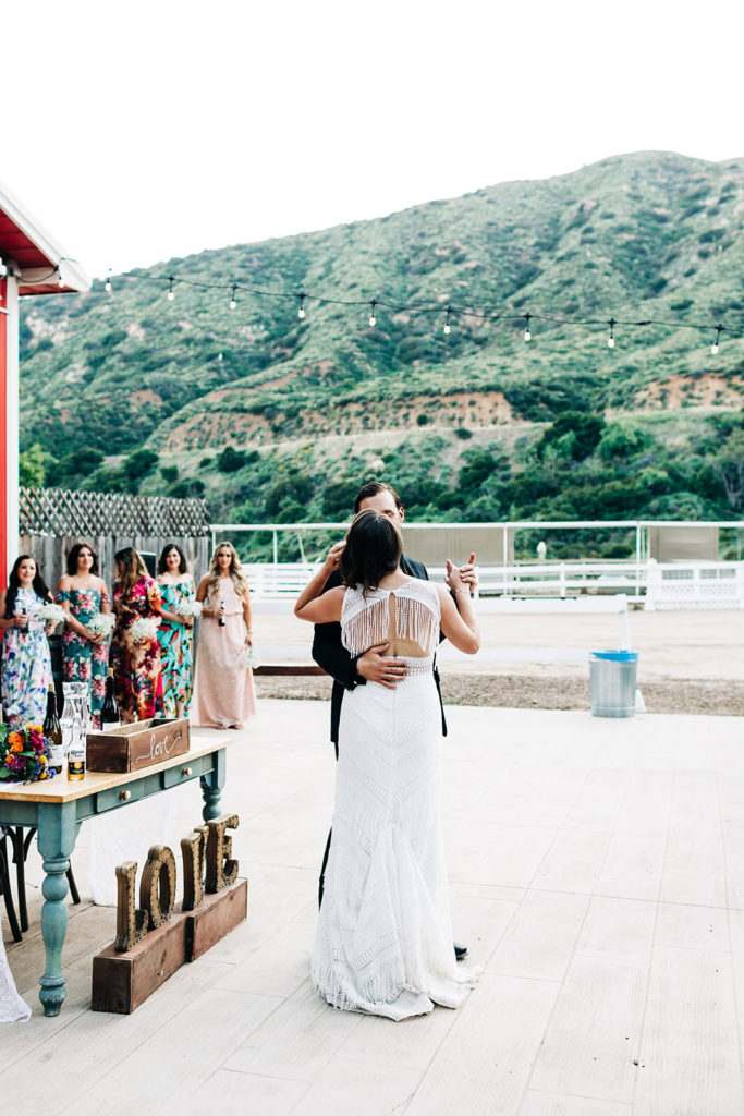 Sweet Pea Ranch In Upland, CA wedding photography; bride and groom dancing