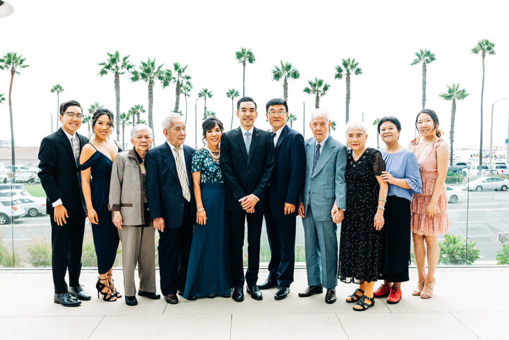 Pasea Hotel & Spa in Huntington Beach, CA wedding photography; groom's group photo with family