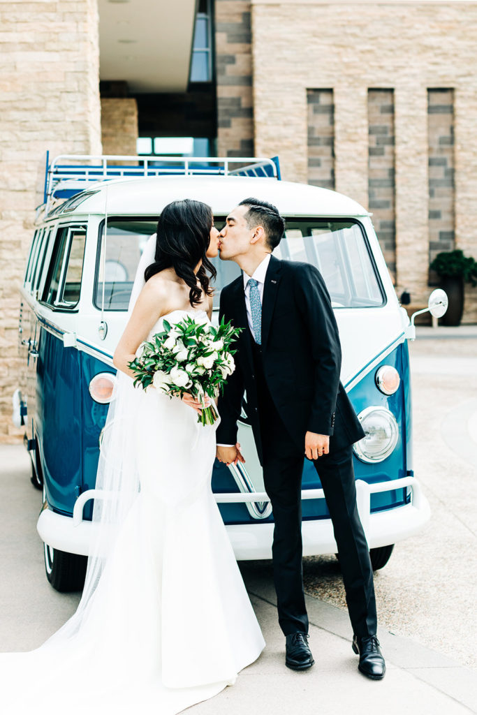 Pasea Hotel & Spa in Huntington Beach, CA wedding photography; bride and groom kissing in front of VW