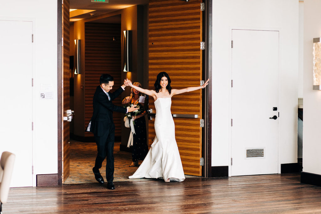 Pasea Hotel & Spa in Huntington Beach, CA wedding photography; bride and groom entering