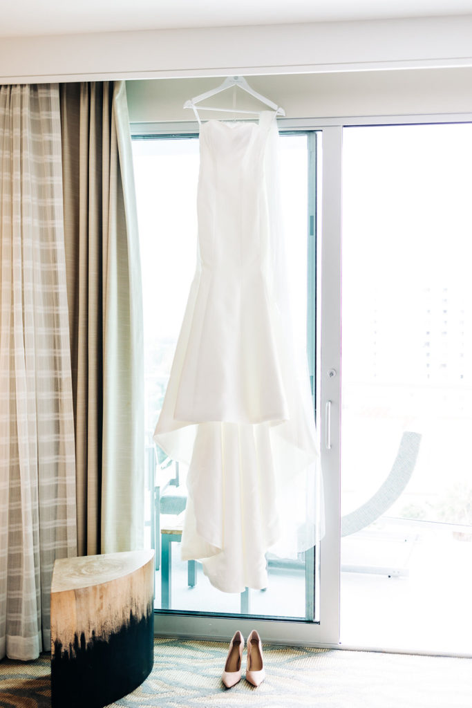 Pasea Hotel & Spa in Huntington Beach, CA wedding photography; bridal dress hanging