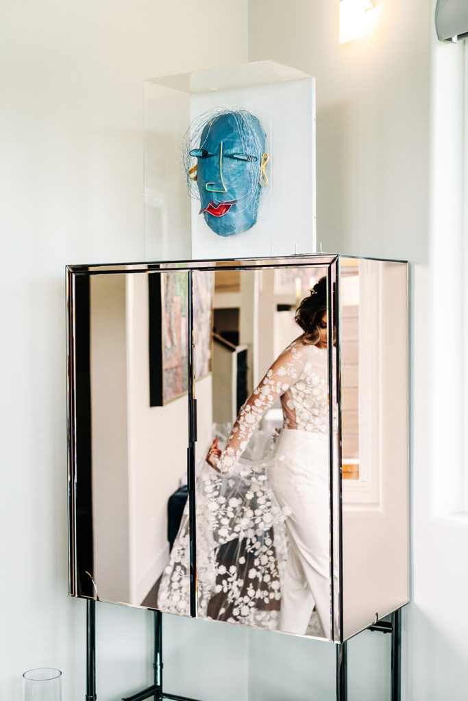 City Hall in San Francisco, CA wedding photography; bride's reflection in the mirror
