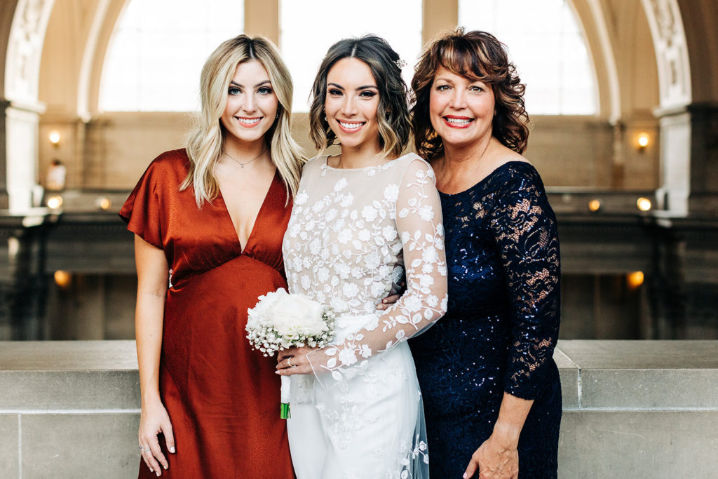 City Hall in San Francisco, CA wedding photography; bride with her mother and sister