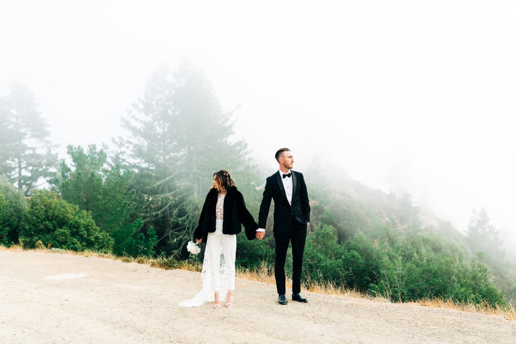 City Hall in San Francisco, CA wedding photography; bride and groom posing with a foggy background