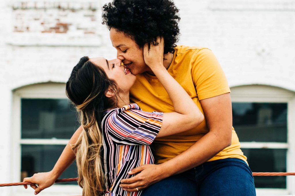 southern california engagement photos; lesbian couple smiling