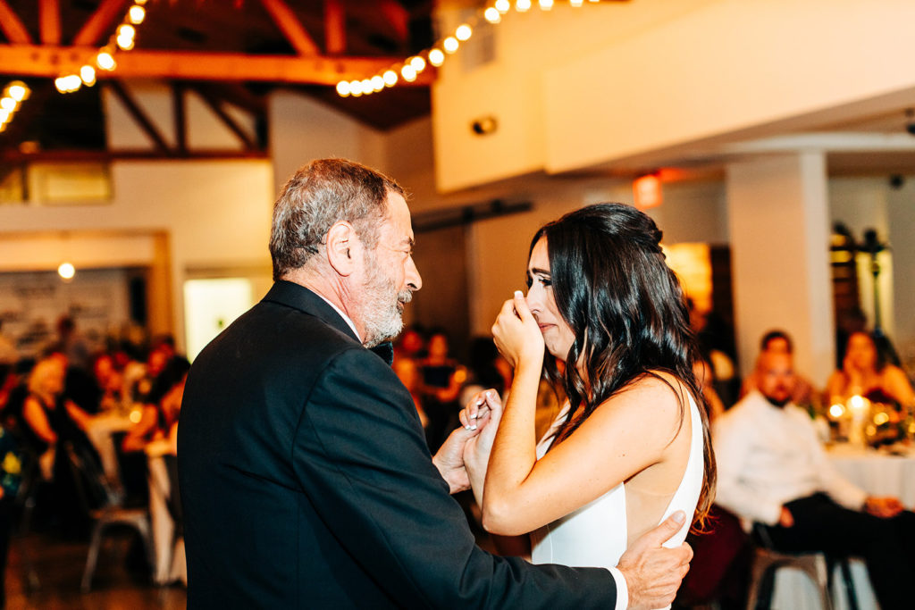 Colony house in Anaheim, CA wedding photography; bride with her father, she couldn't hold her tears