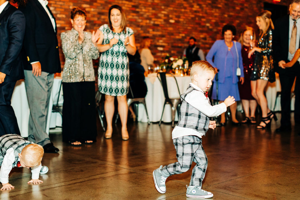 Colony house in Anaheim, CA wedding photography; cute little boy dancing