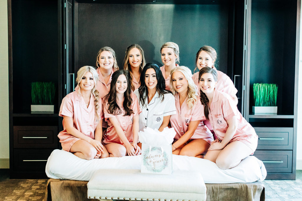 Colony house in Anaheim, CA wedding photography; bride with other bridesmaids on wedding day