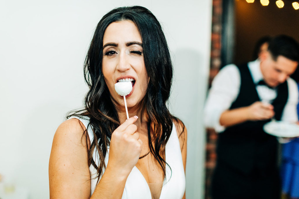 Colony house in Anaheim, CA wedding photography; bride eating