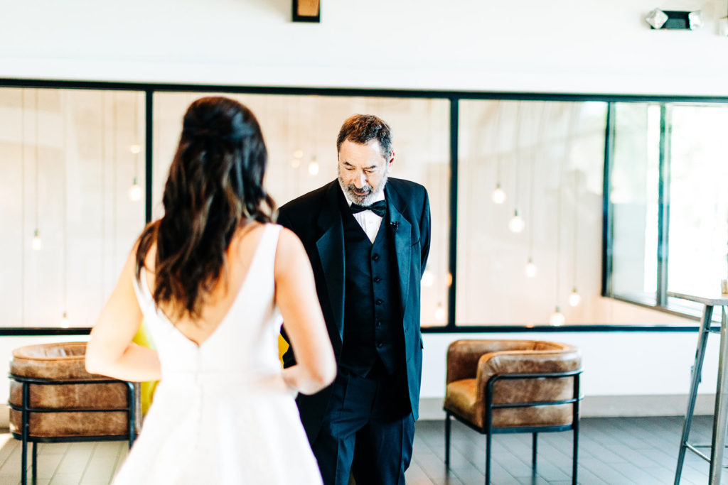 Colony house in Anaheim, CA wedding photography; bride with her father