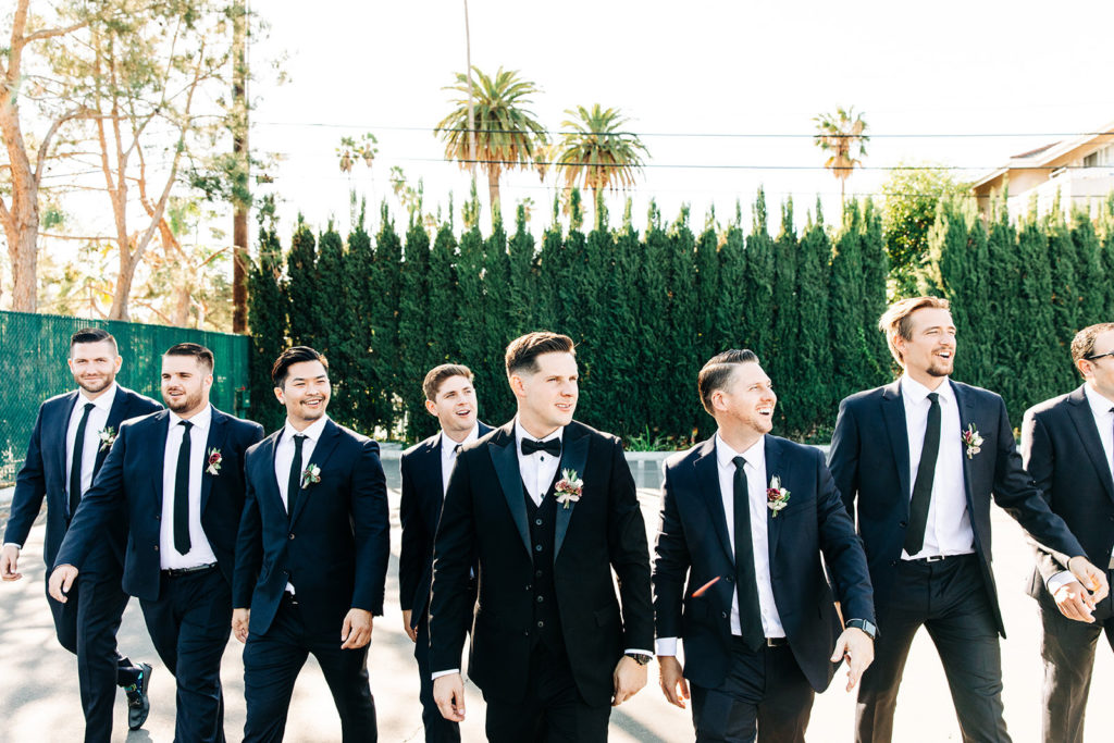 Colony house in Anaheim, CA wedding photography; groom coming with his friends