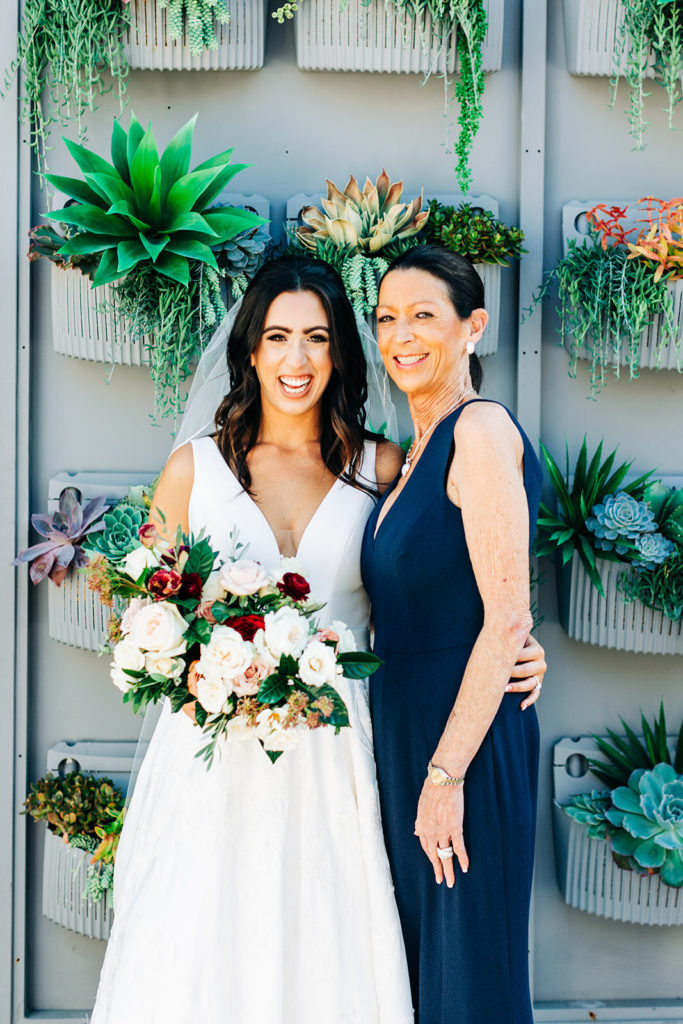 Colony house in Anaheim, CA wedding photography; bride with her friend