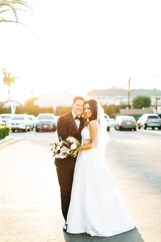 Colony house in Anaheim, CA wedding photography; bride and groom together outside