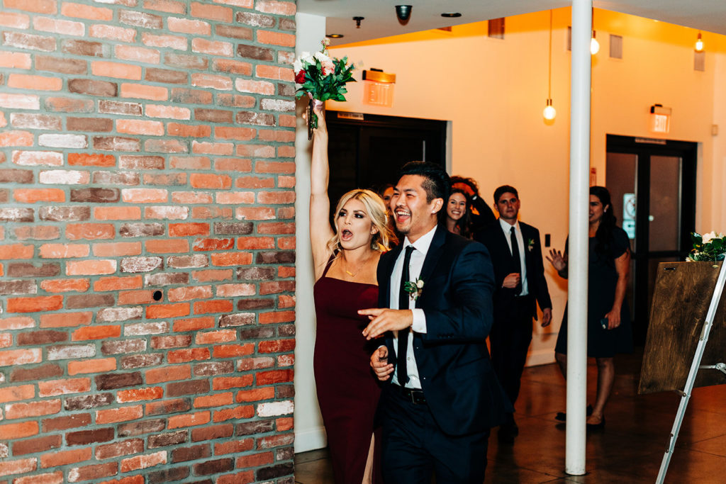 Colony house in Anaheim, CA wedding photography; guest couple entering