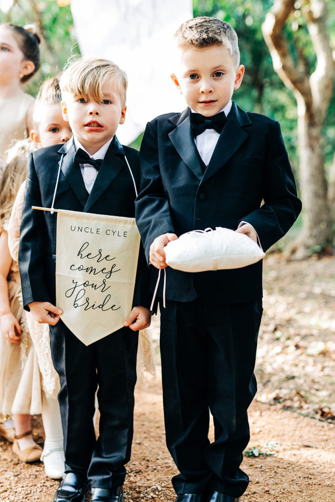 Avalon Legacy Ranch wedding photography; two little boys announcing the arrival of bride