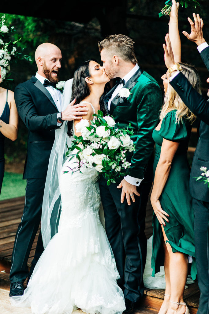 Avalon Legacy Ranch wedding photography; bride & groom kissing