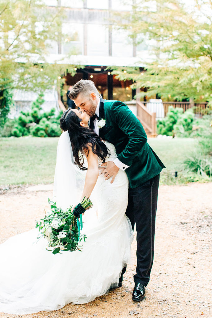 Avalon Legacy Ranch wedding photography; bride and groom kissing
