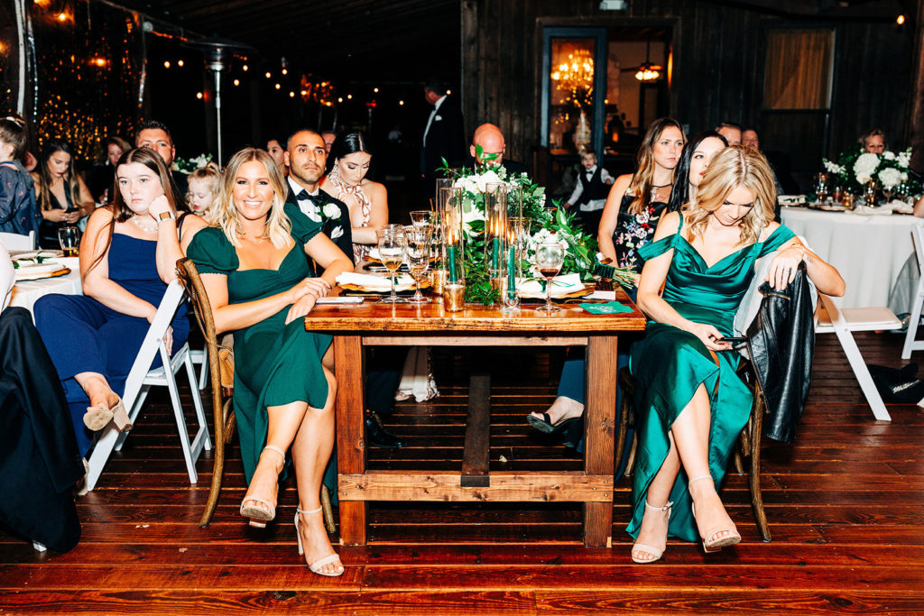 Avalon Legacy Ranch wedding photography; guests sitting on the table