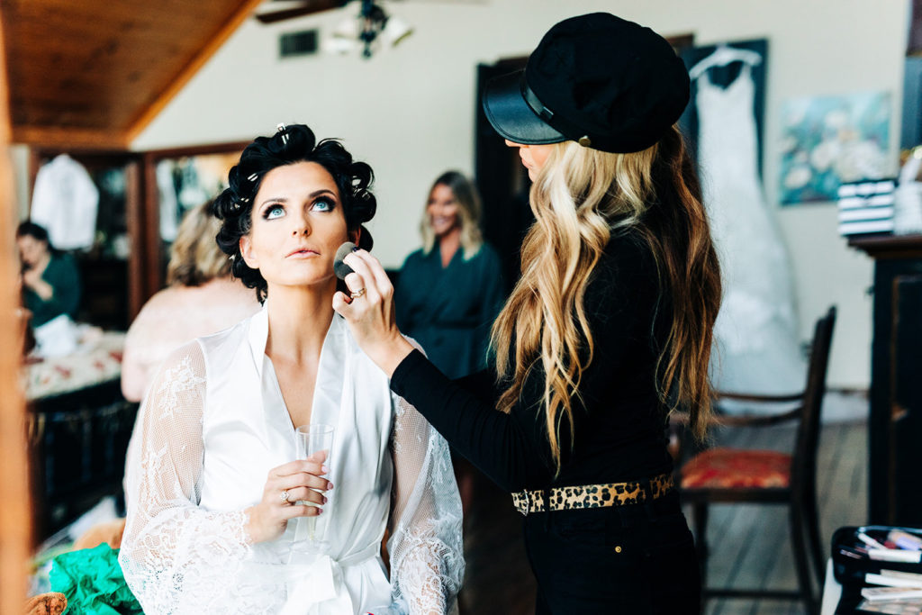 Avalon Legacy Ranch wedding photography; bride having her makeup done
